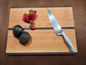 cutting board with fruit and knife