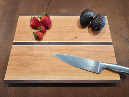 cutting board with fruit and knife